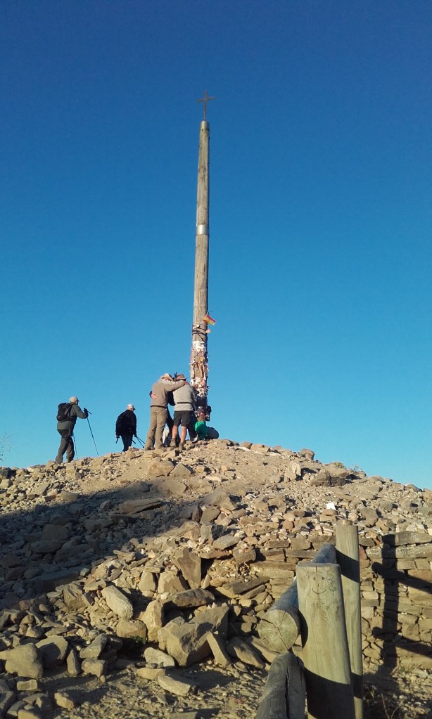 Pilgrims at the Cruz de Ferro in 2016.